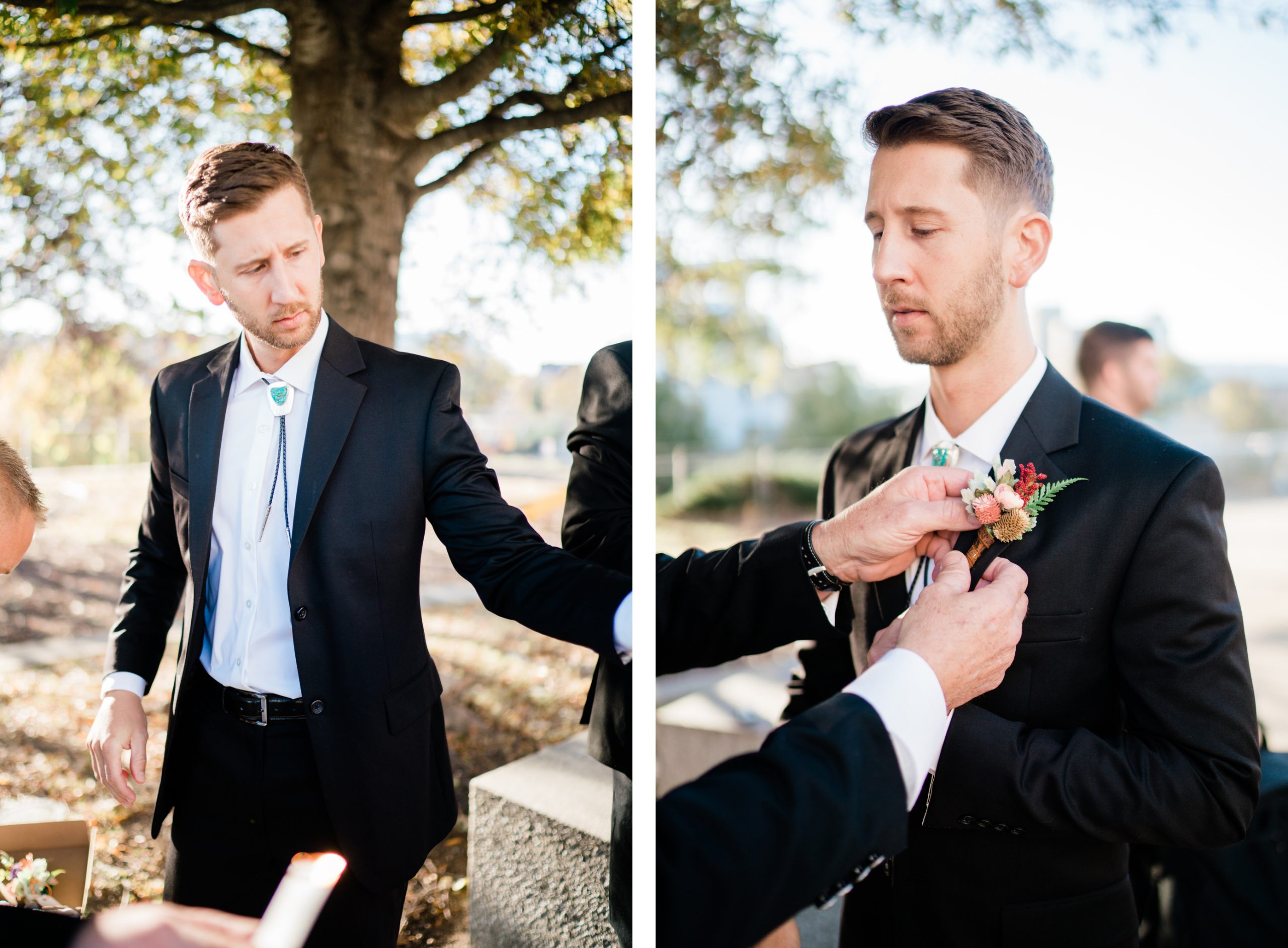 Groom putting on boutonniere 